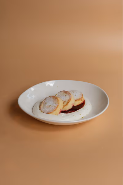 cottage cheese with cherry sauce and yogurt